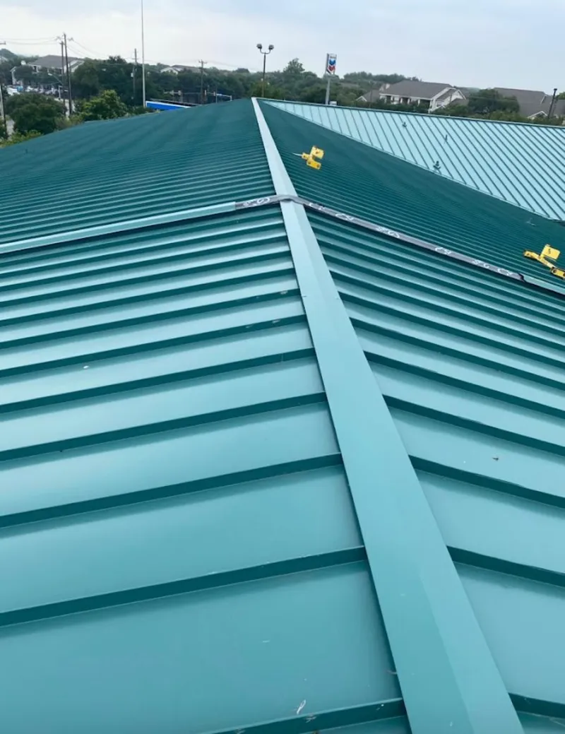 Green commercial metal roof ridge and valley for Metal Roof Repair in Black Jack