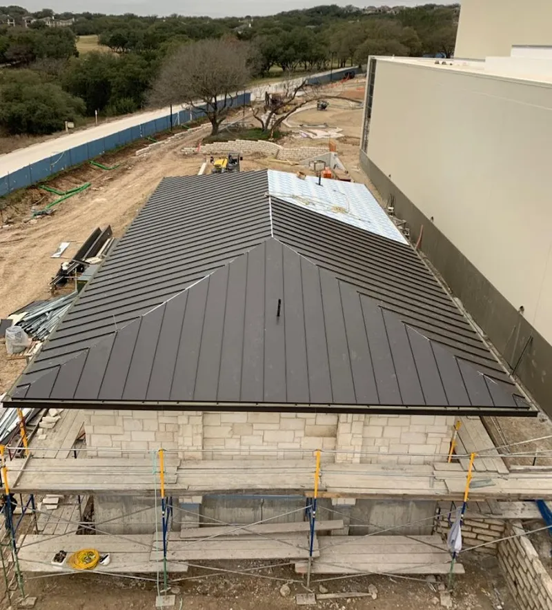 Metal roof new construction with scaffolding in Black Jack